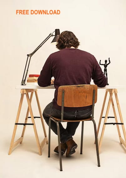 Man working at a desk selling his business